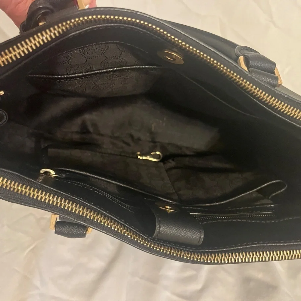 Michael Kors Medium Black Leather Bag. Barely used. Wear on shoulder / handles.